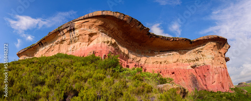 Mushroom Rock, made of red and orange sedimentary sandstone. This landmark is in the Golden Gate Highlands National Park, a nature reserve near the town of Clarens in the Free State, South Africa. photo