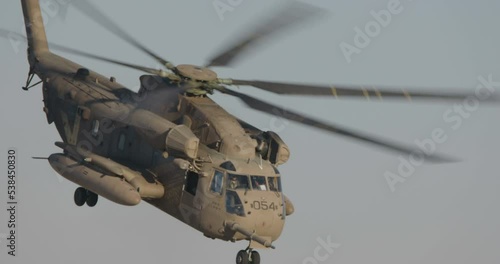 Military transport helicopter during an army rescue operation