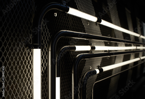 Industrial concept. Tubes, Pressure Gauges. Close up of Pipe, Flow Meter, Water Pumps and Valves of Heating System in a boiler room.