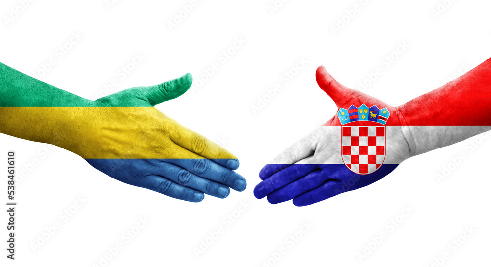 Handshake between Croatia and Gabon flags painted on hands, isolated transparent image. Handshake between Croatia and Gabon flags painted on hands, isolated transparent image.
