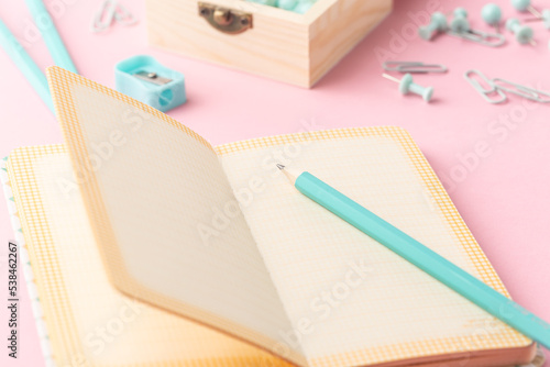 School stationery in turquoise color, flat lay. Back to school