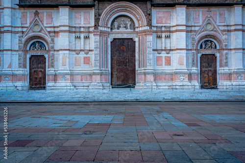 The doors of Saint Petronio in Bologna, early morning.