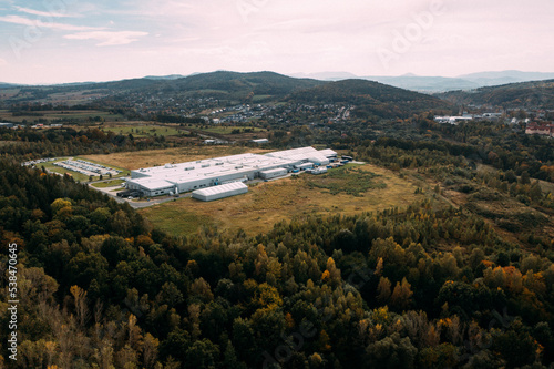 Aerial view of the distribution center, drone photography of the industrial logistic zone.