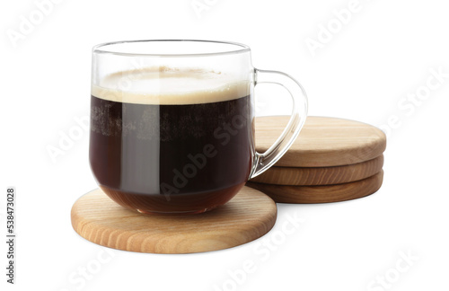 Glass mug of coffee and stylish wooden cup coasters on white background