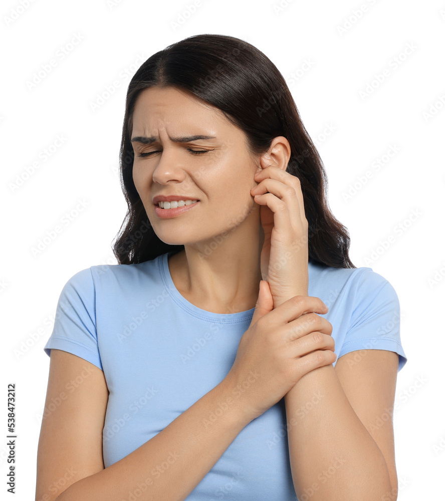 Fototapeta premium Young woman suffering from ear pain on white background
