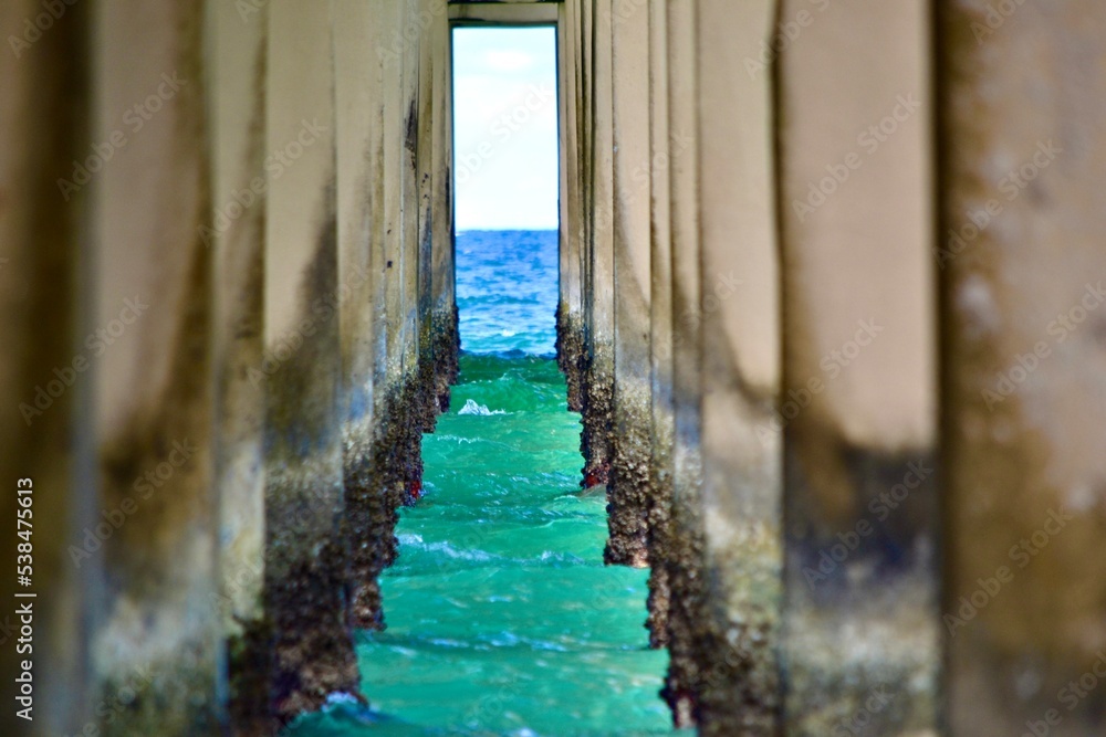 View of The Sea Under the Pier of Sunny Isles Beach, FL