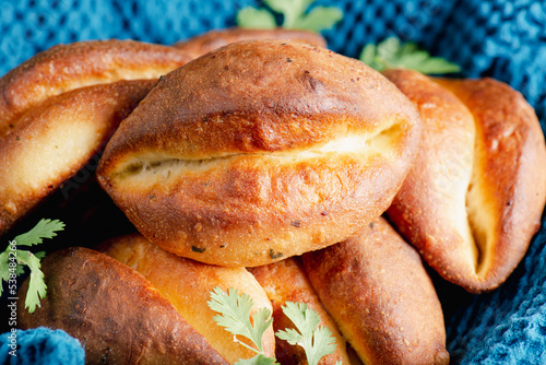 фотографія Delicious soft Parker House Rolls with Garlic Butter.