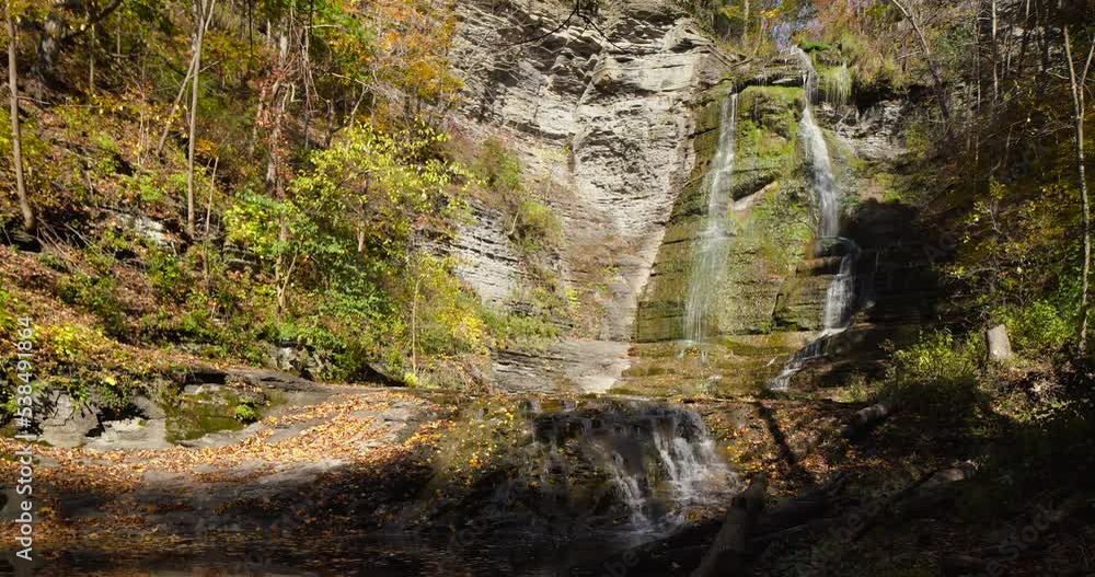 Autumn video of a scenic waterfall located in Lansing NY, Emilie Jonas Nature Falls Trail, near Ithaca, New York. Autumn video of a scenic waterfall located in Lansing NY, Emilie Jonas Nature Falls Trail, near Ithaca, New York.