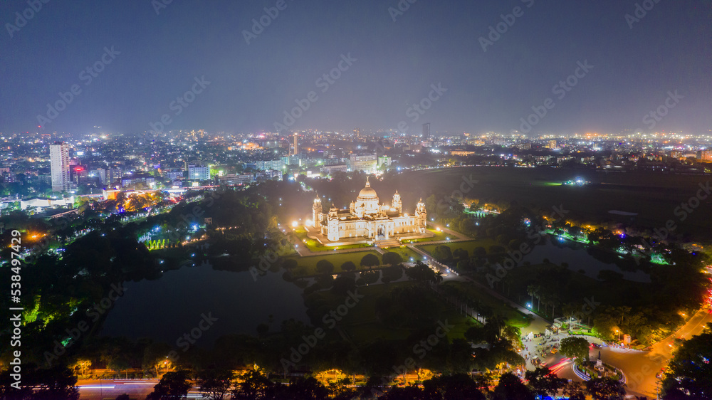 Aerial view of The Victoria Memorial during night, a large marble building in Central Kolkata, West Bengal, India
