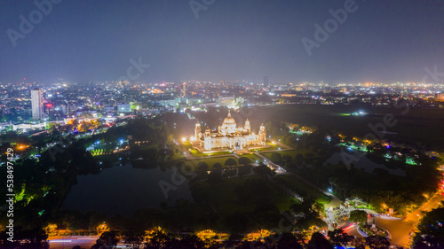 Aerial view of The Victoria Memorial during night, a large marble building in Central Kolkata, West Bengal, India © Arnav Pratap Singh