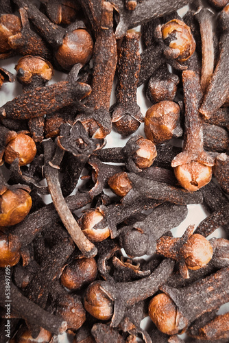 Clove indian-cloves ding xiang laung clavo clou de girofle chiodo di garofano qurnafl nelke Syzygium Aromaticum dry brown spice closeup view image photo photo