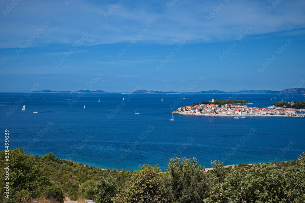 Mediterranean seascape with lot of islands and historic town on peninsula
