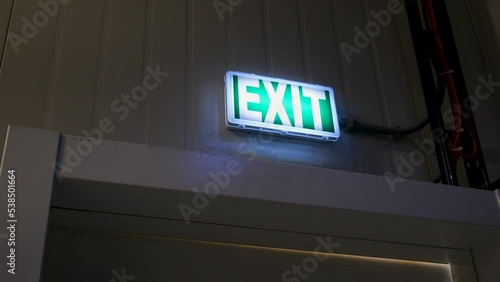 emergency exit sign on the door