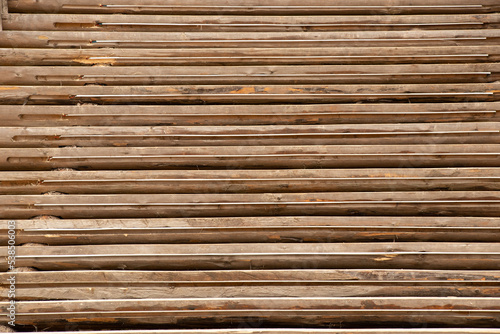 Wooden steps up as a background, stairs and wooden logs