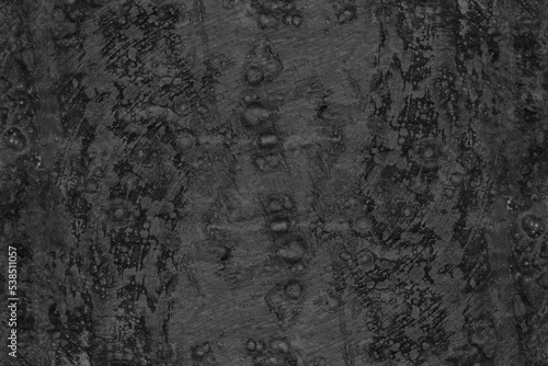 Abstract rough textured dark gray old concrete plaster wall