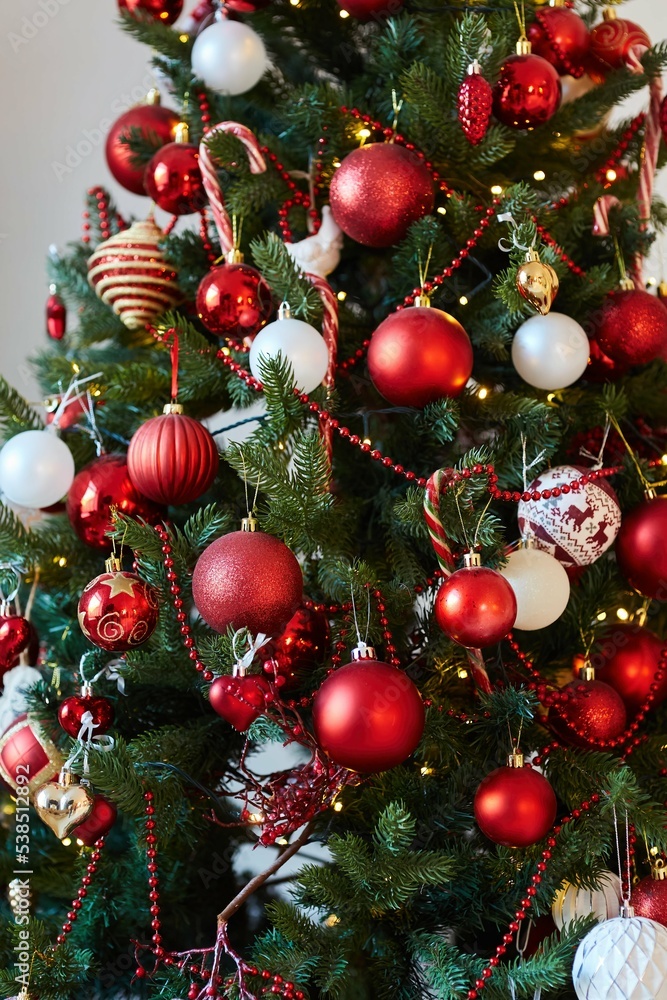 Fototapeta premium Elegant decorated with balls and figures Christmas tree