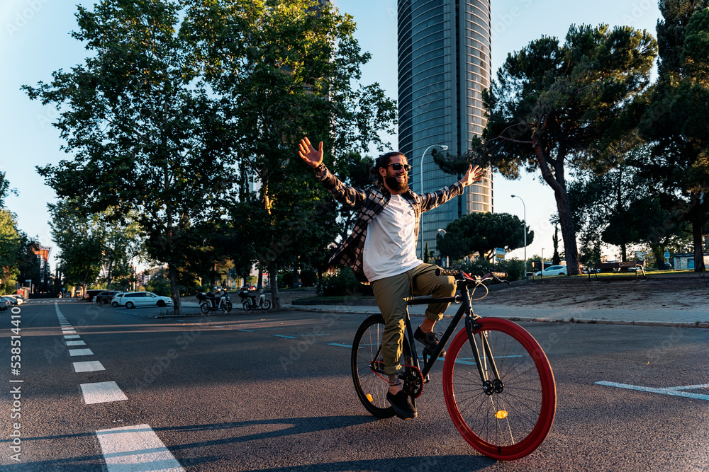 Man Enjoying Riding Bike