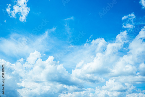 white summer fluffy clouds blue sky