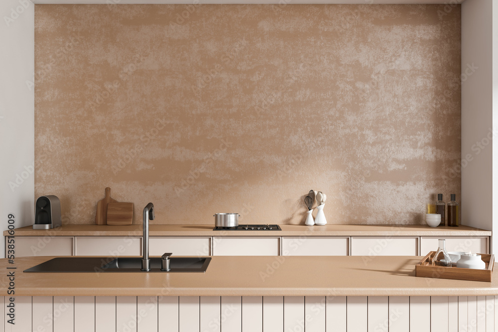 Beige kitchen interior with bar countertop, sink and kitchenware. Empty wall - obrazy, fototapety, plakaty 