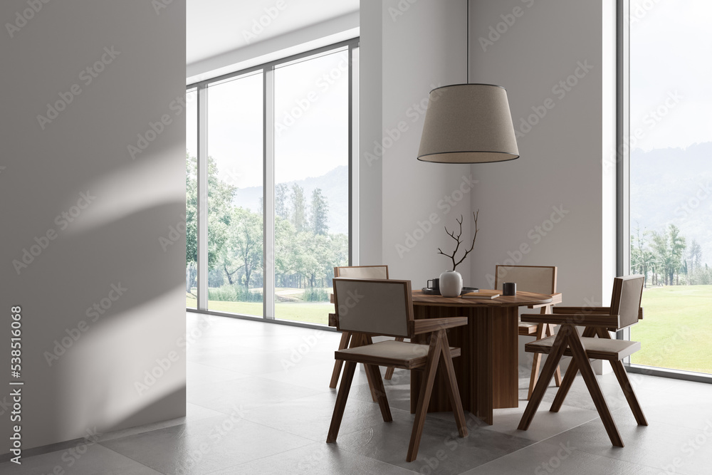 Light living room interior with eating table and chairs, panoramic window Light living room interior with eating table and chairs, panoramic window