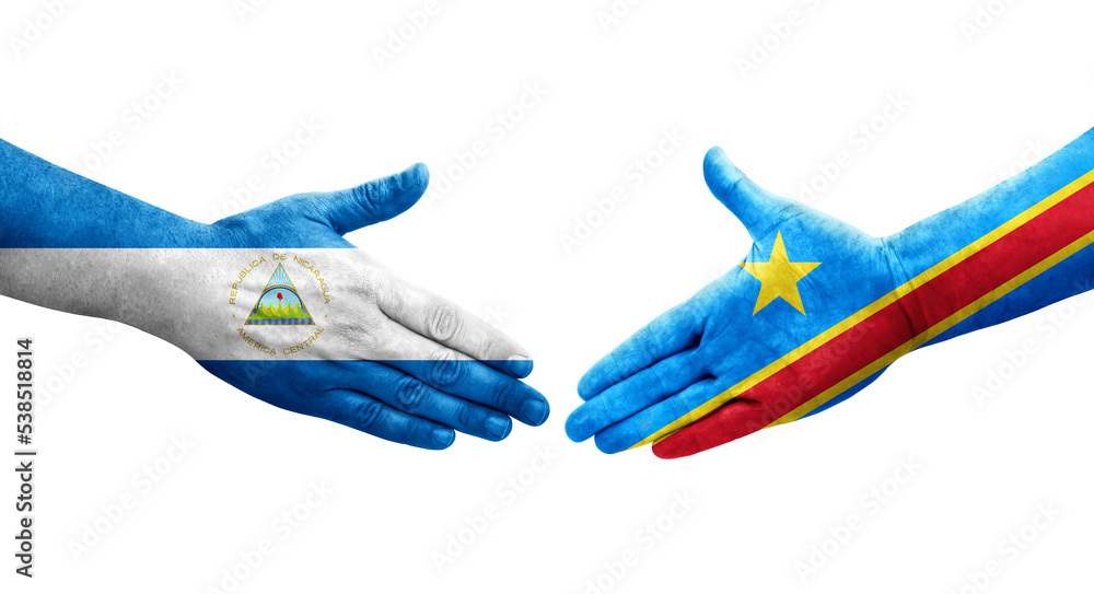Handshake between Dr Congo and Nicaragua flags painted on hands, isolated transparent image. Handshake between Dr Congo and Nicaragua flags painted on hands, isolated transparent image.
