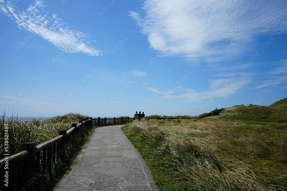 fascinating seaside walkway with clouds