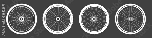 Black bicycle wheel symbols collection. Bike rubber tyre silhouettes. Fitness cycle, road and mountain bike. Vector illustration.