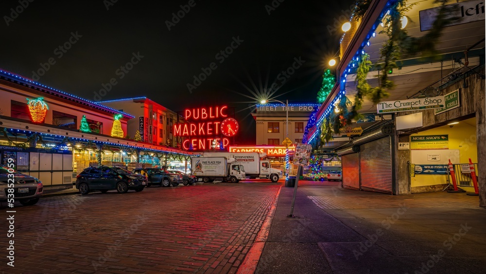 Delivery and setup process at Pike Place market at night, Christmas