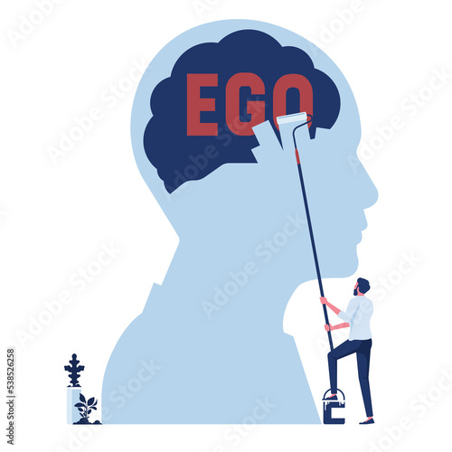 businessman clear word ego out of human brain with paint roller, concept of selfishness as a bad habit from which it is necessary to refuse photo