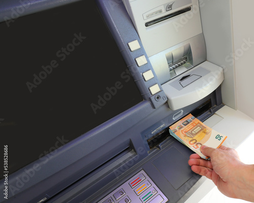 automatic ATM to withdraw money in European 50 Euro banknotes in Europe