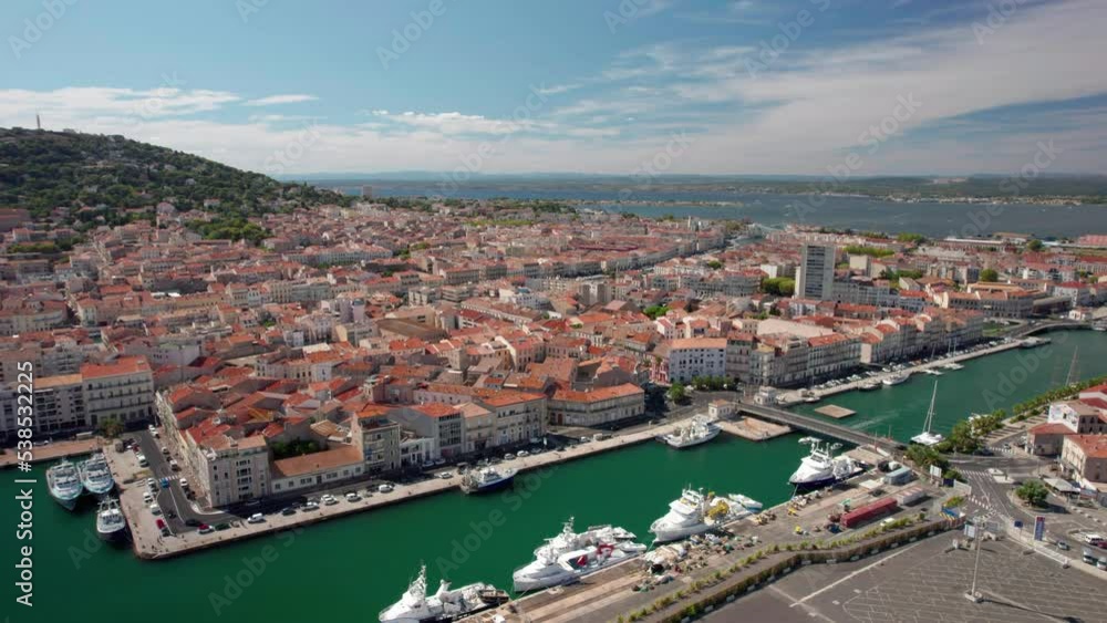 The drone aerial view of the old town center of Sete in the South of France. Sète (Seta in Occitan) is a city in Languedoc-Roussillon in southern France. The drone aerial view of the old town center of Sete in the South of France. Sète (Seta in Occitan) is a city in Languedoc-Roussillon in southern France.
