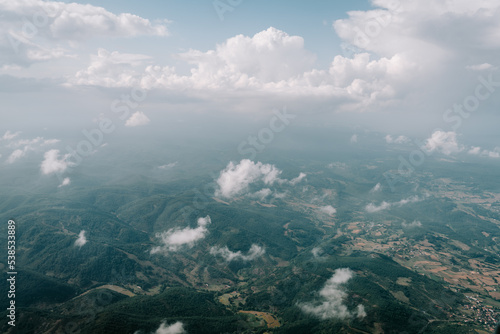 A panoramic top view of daylight and over all clouds under the blue sky  Sky clouds and mountains view  wallpaper concept.
