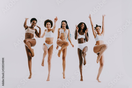 Black african beautiful women wearing underwear lingerie posing in studio for beauty, skin care, body care, body acceptance and diversity concepts