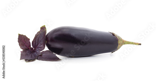 Ripe eggplant with basil.