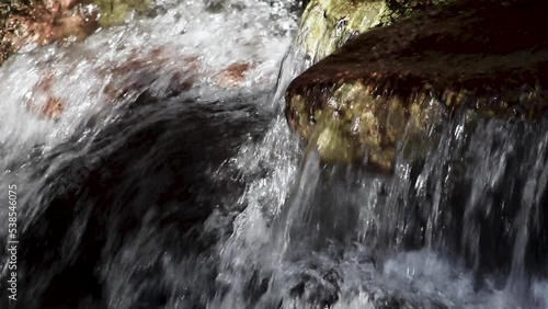 water flowing over rocks, close-up 2