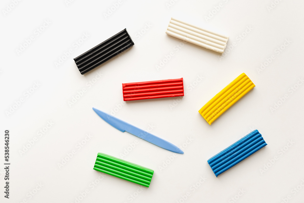 Plasticine on a white background. Children's platinum. Plasticine on a white background. Children's platinum.