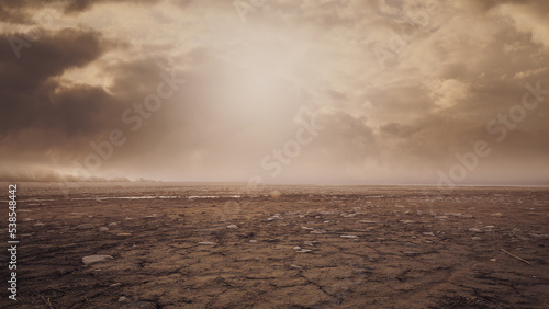 Fotografie Dry barren land with cloudy sky