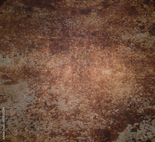 Fondo abstracto con textura de superficie oxidada y suave degradado de luz en marrones y piedra