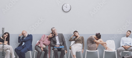 Exhausted people falling asleep in the waiting room