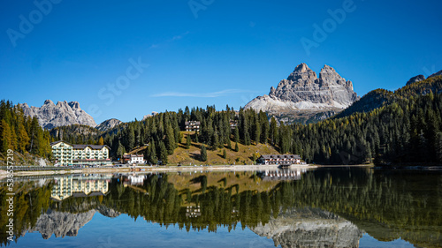 a beautiful lake with reflection in dolomite's 