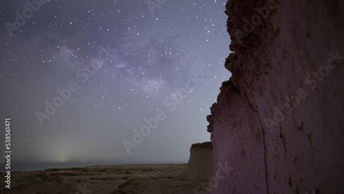 4K Time lapse of night sky milky way over the fossil rock dune  in Abu Dhabi.
