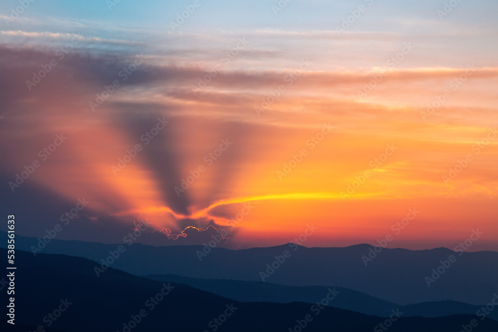 Sunrise. Spring morning. Landscape with high mountains. Foggy morning. Panoramic view. Natural scenery. Wallpaper background. Touristic place Carpathian park.