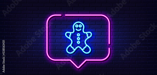 Neon light speech bubble. Gingerbread man line icon. Ginger cookie sign. Sweet holiday food symbol. Neon light background. Gingerbread man glow line. Brick wall banner. Vector