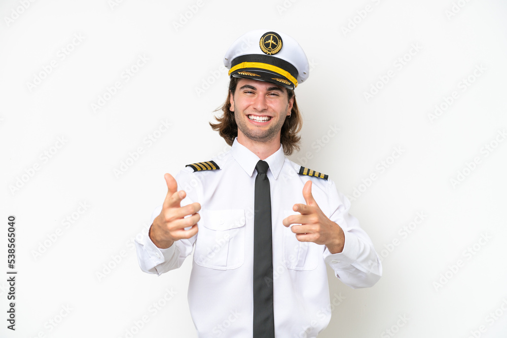 handsome Airplane pilot isolated on white background pointing to the front and smiling handsome Airplane pilot isolated on white background pointing to the front and smiling