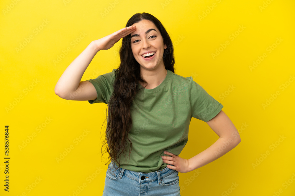Young caucasian woman isolated on yellow background has realized something and intending the solution Young caucasian woman isolated on yellow background has realized something and intending the solution