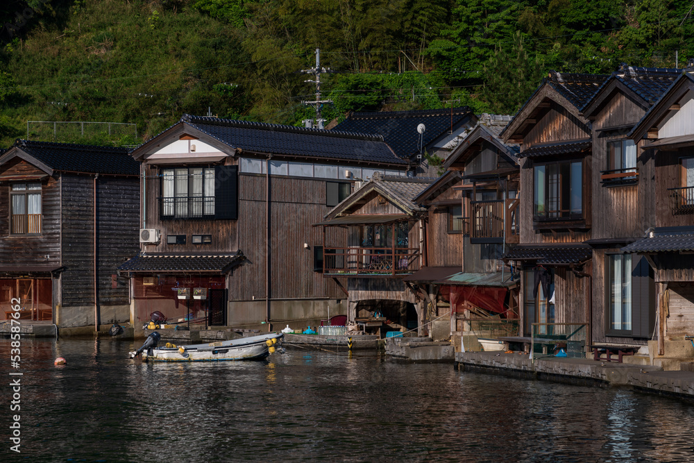 Lined up boathouses at Ine Town in Kyoto, Japan. Lined up boathouses at Ine Town in Kyoto, Japan.
