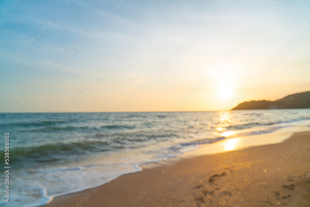 abstract blur beautiful sea beach with sunset time for background abstract blur beautiful sea beach with sunset time for background