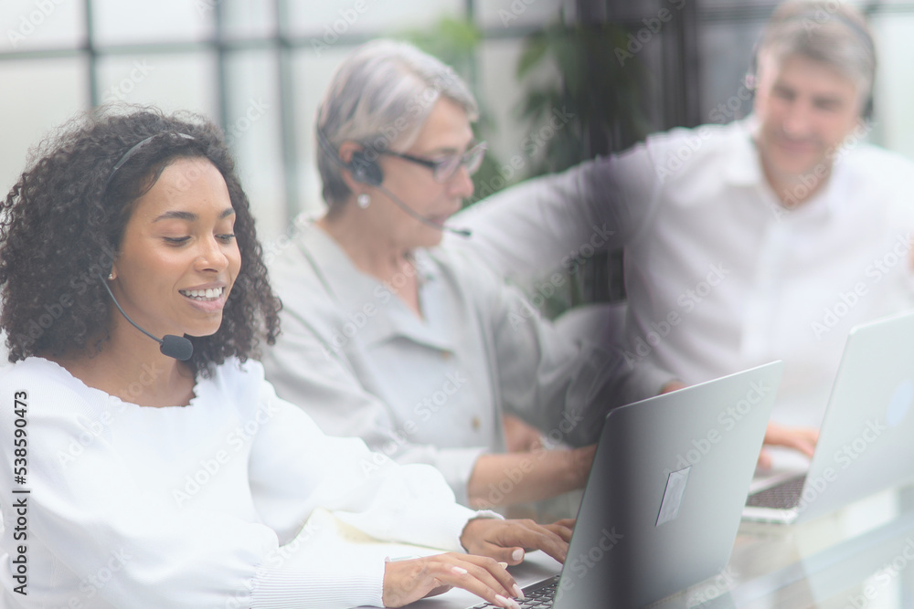 Business group working in customer and help desk office Business group working in customer and help desk office