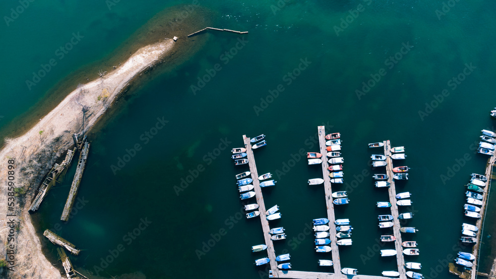 The boat station is on top. A lot of motorboats on the water, taken from above
