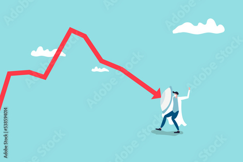 businessman holding shield to cover and protect from downturn arrow. Protection or defensive stock in economy crisis